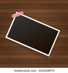 vintage photo frame with shadow isolated on wooden wall background. Vector Photo realistic Mockups with empty space for photo. old photo icon