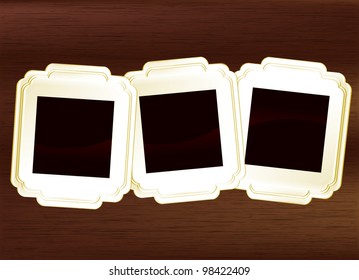 Vintage photo frames set on dark wood background