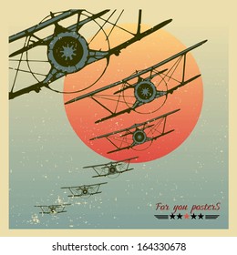 Vintage Planes dive against the evening sun