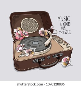 Vintage Portable Gramophone with a pink cherry flowers. Vector illustration.