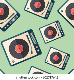 Vintage portable record player flat icon seamless pattern.