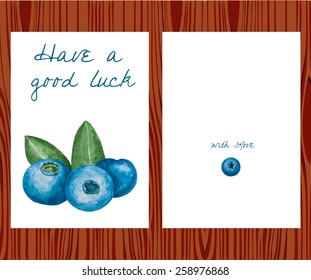 Vintage postcard(invitation) with watercolor blueberries with green leaves isolated on white background. Vector version 