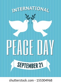 Vintage poster for the International Day of Peace with a dove carrying an olive branch.