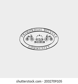 vintage primordial bike community logo design template, retro brush ancient bicycle logo vector design.