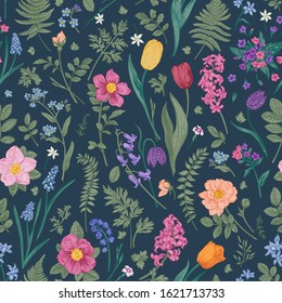 Vintage print with small flowers on a dark background. Vector floral seamless pattern. Spring and summer garden and meadow plants.