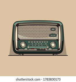 vintage radio is standing in front of light brown wall background