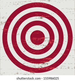 Vintage red target on white scratched background