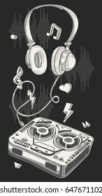 Vintage reel to reel tape recorder with headphones