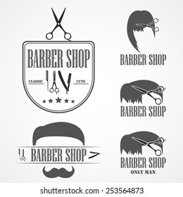 Vintage Retro barber shop logos, labels, badges and design elements. Vector illustrations.