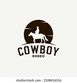 Vintage Retro Cowboy Riding Horse Silhouette logo design illustration