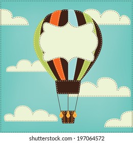 Vintage or retro hot air balloon in sky with clouds  and text box, for scrapbooking or backgrounds, vector format