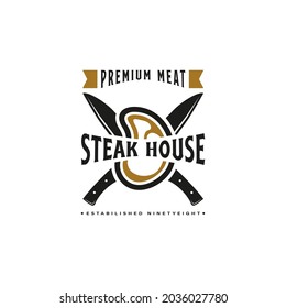 Vintage Retro Steak House Logo Design. With crossed cleavers or knives, and beef or meat icons. Premium and luxury label or sticker
