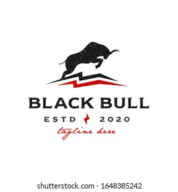 Vintage retro strong attack black bull illustration logo Premium Vector