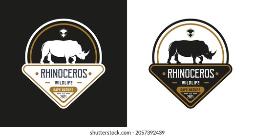 Vintage Rhino Logo. With rhinoceros, shield, and grass icon. Premium, luxury, black, and gold logo design