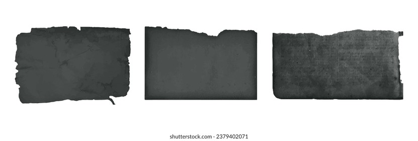 Vintage ripped torn pieces of paper. Old black faded paper
