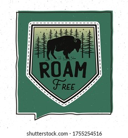 Vintage Roam Free badge illustration design. Travel emblem with text. Unusual hipster adventure style patch. Stock vector