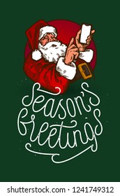 Vintage Santa Claus using Smartphone with seasons greetings curly calligraphy Christmas card