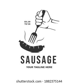 vintage sausage logo with hand hold a fork vector design