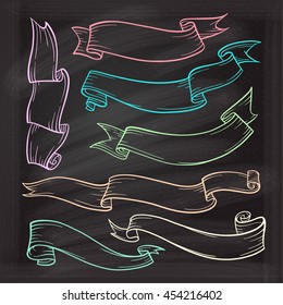 Vintage scrolls set on the chalkboard background