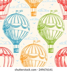 Vintage seamless background with balloons flying in the sky, clouds and birds