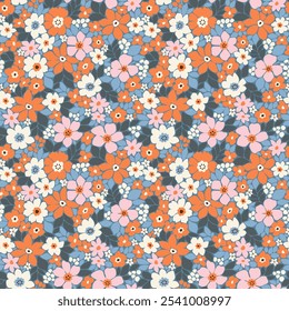 Vintage seamless floral pattern. Vintage floral background. Floral pattern with small pastel color flowers on a blue background. Seamless pattern for design and fashion prints. Ditsy style.