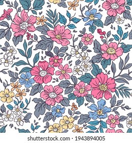 Vintage seamless floral pattern. Liberty style background of small  pink flowers. Small flowers scattered over a white background. Stock vector for printing on surfaces. Realistic flowers. 