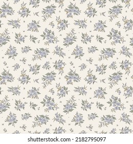 Vintage seamless floral pattern. Liberty style background of small pastel blue flowers. Small flowers scattered over a white background. Stock vector for printing on surfaces. Abstract flowers.