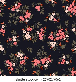 Vintage seamless floral pattern. Liberty style background of small pink and white flowers. Small flowers scattered over a black background. Stock vector for printing on surfaces. Abstract flowers.