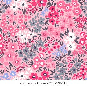 Vintage seamless floral pattern. Liberty style background of small pastel colorful flowers. Light pink background. Ditsy print. Floral background.  Abstract flowers.