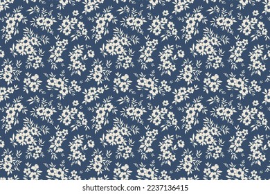 Patrón floral inmaculado. Fondo de flores blancas pequeñas con un estilo de libertad. Flores pequeñas esparcidas sobre un fondo azul marino. Vector de material para imprimir en superficies. Flores abstractas.