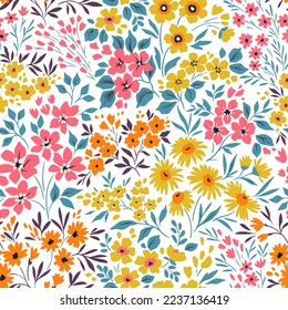 Vintage seamless floral pattern. Liberty style background of small pastel colorful flowers. Small flowers scattered over a white background. Stock vector for printing on surfaces. Abstract flowers.