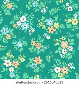 Vintage seamless floral pattern. Liberty style background of small pastel colorful flowers. Small flowers scattered over a emerald background. Stock vector for printing on surfaces. Abstract flowers