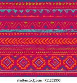 Vintage seamless geometric pattern. Ethnic and tribal motifs. Horizontal lines. Grunge texture, scratches. Pink, blue, orange and green colors. Vector illustration.