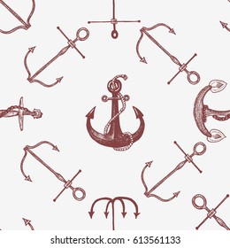 Vintage seamless pattern with anchors, engraved old looking hand drawn, sketch or tattoo style,  aquatic or marine theme background.
