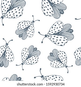 Vintage seamless pattern with butterflies in doodle style. Decoration hand drawn butterflies. The background is perfect for fabric, wallpaper for the nursery, poster and more. Vector illustration.