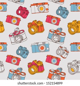 Vintage seamless pattern with camera. Vector illustration.