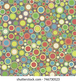 Vintage seamless pattern. Consists of geometric elements arranged on a gray background. The elements have round shape, different color and size.