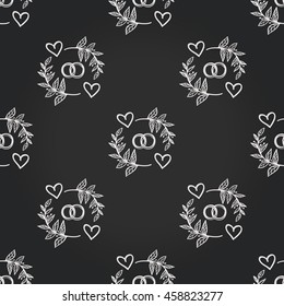 Vintage seamless pattern with couple of rings. Background for eco forest wedding or autumn celebrations. Floral rustic symbols and elements in chalkboard hand drawing style.