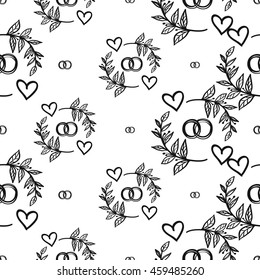 Vintage seamless pattern with couple of rings and couple rings. Background for eco forest wedding or autumn celebrations. Black floral rustic symbols and elements on white hand drawing style.
