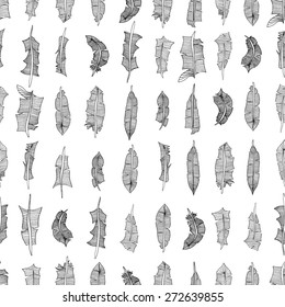 Vintage seamless pattern with hand-drawn feathers. Illustration