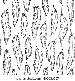 Vintage seamless pattern with hand-drawn feathers. Vector illustration.