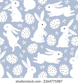 Vintage seamless pattern with hares rabbits and Easter eggs in peas. Small cute daisy flowers. Cartoon animals in hand-drawn doodle style. Monochrome white characters on a blue background. Vector