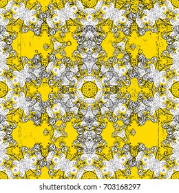 Vintage seamless pattern on a yellow background with white elements. Christmas 2019, snowflake, new year.