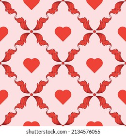 Das Vintage nahtlose Muster mit roten Herzen und dekorativen Blättern. Valentinstag-Hintergrund. 