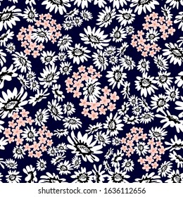 Vintage seamless pattern with small wildflowers. Floral print with abstract chamomiles. Template for textile design, cards, scrapbooking.