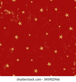 Vintage seamless pattern with stars in red and gold. Tiling festive background, greeting card or wrapping paper.