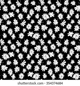 Vintage seamless tiny floral pattern. Black background of small white flowers.  Design for wallpaper, clothing, wrapping, fabric, cover, textile