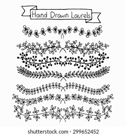 Vintage set of hand drawn decorative laurels. Floral vector graphic elements