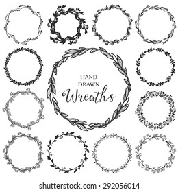 Vintage set of hand drawn rustic wreaths. Floral vector graphic. Nature design elements.