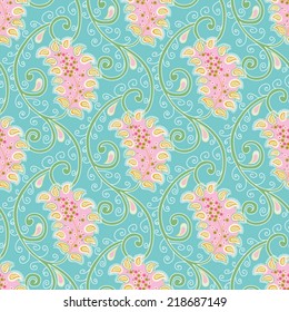 Vintage shabby chic paisley pattern with small daisy ornament on a blue background
